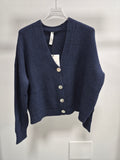 Cardigan con bottoni madreperla TENSIONE IN