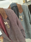 Giacca con patch e spille